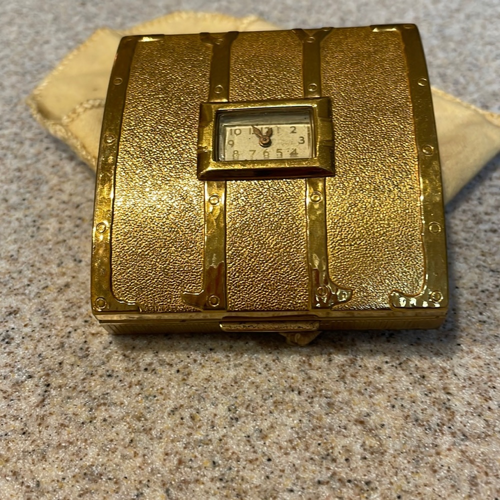 Evans 1940’s Compact gold tone with built in watch . Vintage , RARE